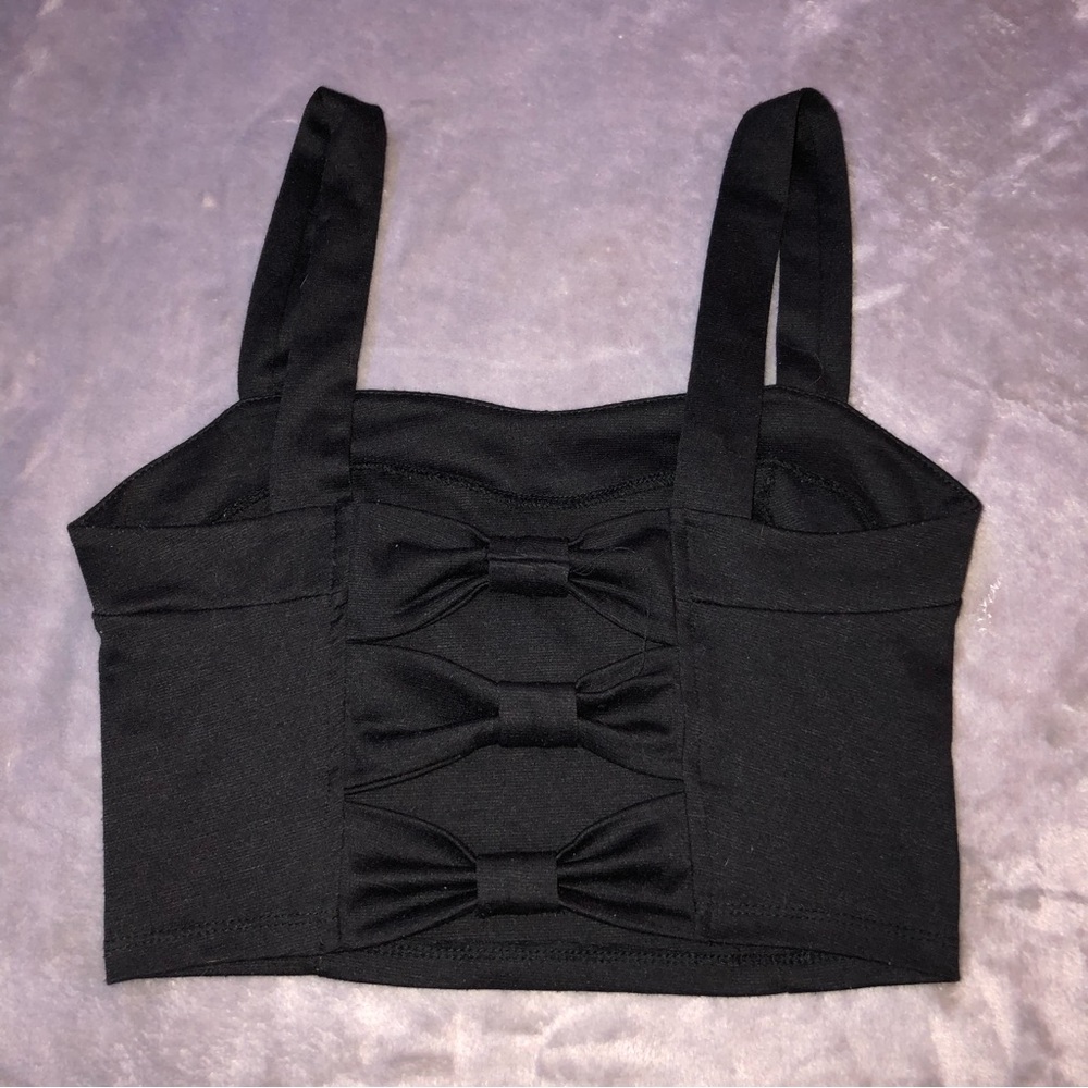 Cropped black top with an open bow back, shirt